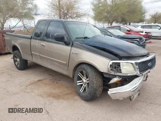 2003 Ford F-150 XL with VIN 1FTRX18LX3NB05434, listed as a IAAI auction lot 41799343 with 1 mi miles. Bid and sale history available at carsss.com. Image 1.