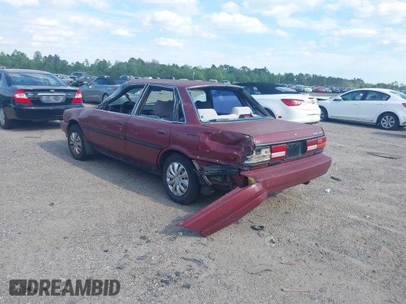 1991 Toyota Camry DLX z VIN 4T1SV21E0MU347371, wystawiony jako IAAI lot #42048695 z przebiegiem 209 451 mil mil oraz . Historia ofert i sprzedaży dostępna na DreamBid. Obrazek 3.