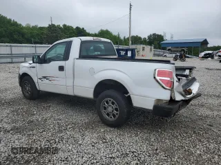 2014 Ford F-150 XL with VIN 1FTMF1CM4EKF93944, listed as a Copart auction lot 56113445 with 153,263 mi miles and Salvage title. Bid and sale history available at DreamBid. Image 2.