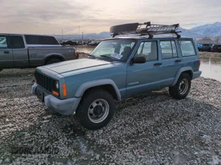 1999 Jeep Cherokee SE with VIN 1J4FF28S5XL646812, listed as a Copart auction lot 87951115 with 230,161 mi miles and Clean title. Bid and sale history available at DreamBid. Image 1.