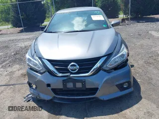 2016 Nissan Altima SR with VIN 1N4AL3AP1GC204037, listed as a IAAI auction lot 42558701 with 82,002 mi miles and . Bid and sale history available at DreamBid. Image 12.