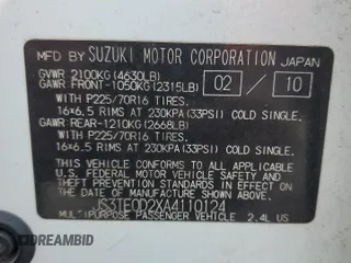 2010 Suzuki Grand Vitara Premium z VIN JS3TE0D2XA4110124, wystawiony jako Copart lot #74387914 z przebiegiem 91 106 mil mil oraz Szkoda całkowita • Salvage title. Historia ofert i sprzedaży dostępna na DreamBid. Obrazek 14.