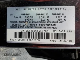 2012 Mazda 3 i Touring with VIN JM1BL1V82C1642786, listed as a Copart auction lot 49008125 with 110,688 mi miles and Salvage Title. Bid and sale history available at DreamBid. Image 14.