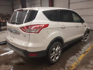 2013 Ford Escape SEL with VIN 1FMCU9H98DUD82751, listed as a IAAI auction lot 41575198 with 166,580 mi miles. Bid and sale history available at carsss.com. Image 4.