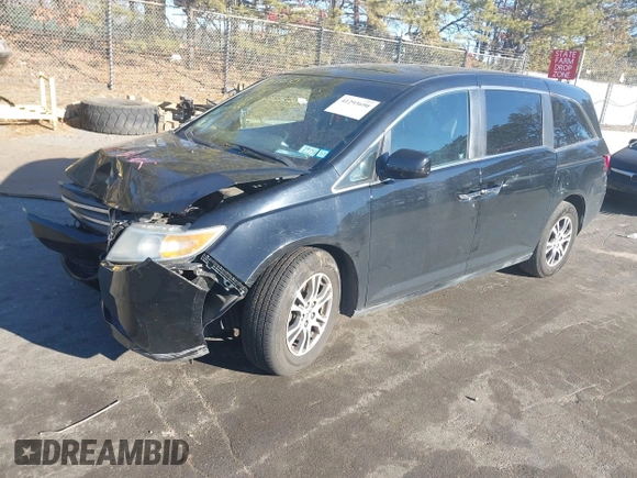 2011 Honda Odyssey EX-L with VIN 5FNRL5H61BB059275, listed as a IAAI auction lot 41293690 with 105,511 mi miles and . Bid and sale history available at carsss.com. Image 17.