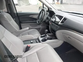 2017 Honda Pilot EX-L with VIN 5FNYF6H50HB101394, listed as a IAAI auction lot 42083318 with 159,359 mi miles and . Bid and sale history available at DreamBid. Image 5.