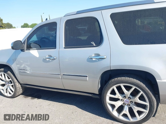 2011 GMC Yukon Denali with VIN 1GKS2EEF3BR350688, listed as a IAAI auction lot 41993776 with 241,941 mi miles. Bid and sale history available at carsss.com. Image 14.