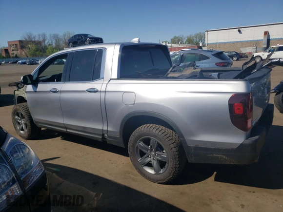 2023 Honda Ridgeline RTL-E with VIN 5FPYK3F77PB059763, listed as a Copart auction lot 54026045 with 34,114 mi miles and Salvage title. Bid and sale history available at DreamBid. Image 2.