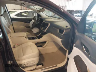 2021 GMC Acadia Denali with VIN 1GKKNXLS2MZ140119, listed as a IAAI auction lot 42553557 with 50,197 mi miles and . Bid and sale history available at DreamBid. Image 5.