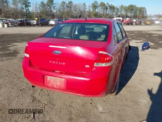 2008 Ford Focus SE with VIN 1FAHP35N18W272267, listed as a IAAI auction lot 41003854 with 239,062 mi miles. Bid and sale history available at carsss.com. Image 4.
