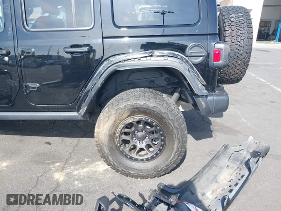 2022 Jeep Wrangler Unlimited Rubicon with VIN 1C4HJXFN0NW242903, listed as a IAAI auction lot 41448636 with 28,007 mi miles and . Bid and sale history available at DreamBid. Image 13.
