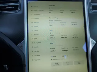 2015 Tesla Model S 85D with VIN 5YJSA1E40FF114095, listed as a Copart auction lot 84114284 with 114,882 mi miles and Salvage Title. Bid and sale history available at carsss.com. Image 9.