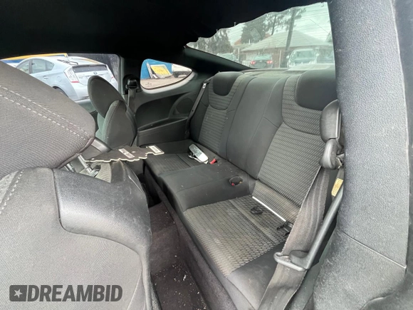 2013 Hyundai Genesis Coupe R-Spec with VIN KMHHT6KD9DU101531, listed as a Copart auction lot 49768125 with 103,932 mi miles and Clean title. Bid and sale history available at DreamBid. Image 6.