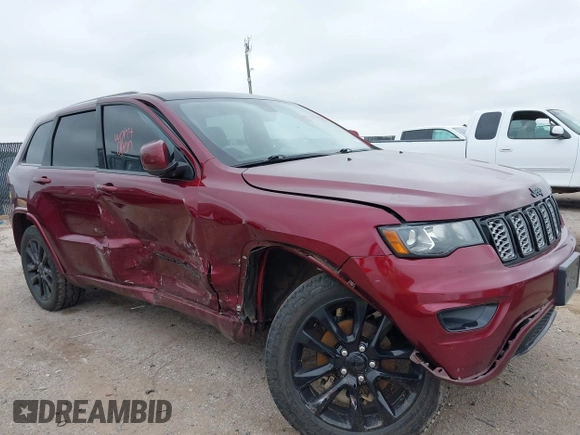 2018 Jeep Grand Cherokee Altitude with VIN 1C4RJEAGXJC281236, listed as a IAAI auction lot 42378899 with 102,276 mi miles and . Bid and sale history available at DreamBid. Image 6.
