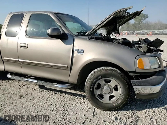2002 Ford F-150 XL with VIN 1FTRX17L22NA48307, listed as a Copart auction lot 74238074 with 80,010 mi miles and Salvage title. Bid and sale history available at DreamBid. Image 11.