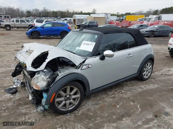 2011 MINI Cooper Convertible s with VIN WMWZP3C55BTX82922, listed as a IAAI auction lot 41408777 with 82,764 mi miles. Bid and sale history available at carsss.com. Image 2.
