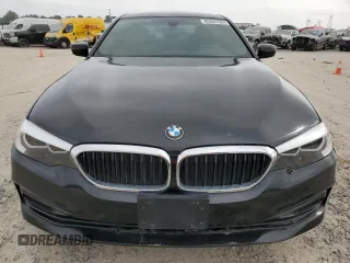 2018 BMW 5 Series 530i with VIN WBAJA5C54JG899845, listed as a Copart auction lot 83007584 with 57,379 mi miles and Salvage Title. Bid and sale history available at DreamBid. Image 5.