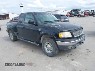 1999 Ford F-150 XL z VIN 2FTRX08L7XCA32562, wystawiony jako IAAI lot #42364671 z przebiegiem Nie podano mil oraz . Historia ofert i sprzedaży dostępna na DreamBid. Obrazek 1.
