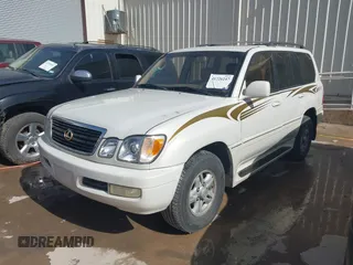 2000 Lexus LX 470 with VIN JT6HT00W5Y0080249, listed as a IAAI auction lot 41726247 with 315,707 mi miles and . Bid and sale history available at carsss.com. Image 2.