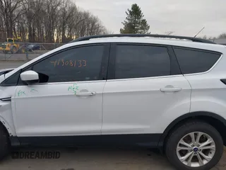 2018 Ford Escape SE z VIN 1FMCU9GD2JUC77186, wystawiony jako IAAI lot #41308133 z przebiegiem 123 156 mil mil oraz . Historia ofert i sprzedaży dostępna na DreamBid. Obrazek 14.