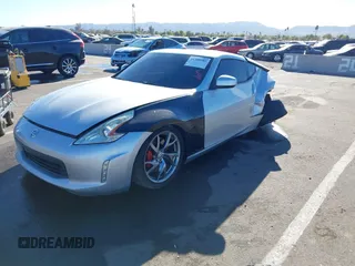 2014 Nissan 370Z Nismo with VIN JN1AZ4EHXEM634418, listed as a IAAI auction lot 41308580 with 84,074 mi miles and . Bid and sale history available at DreamBid. Image 17.