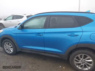 2017 Hyundai Tucson SE Plus with VIN KM8J33A42HU410216, listed as a IAAI auction lot 41337805 with 63,515 mi miles. Bid and sale history available at carsss.com. Image 14.