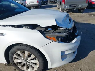 2016 Kia Optima LX with VIN 5XXGT4L36GG005859, listed as a IAAI auction lot 41053277 with 127,783 mi miles. Bid and sale history available at carsss.com. Image 17.