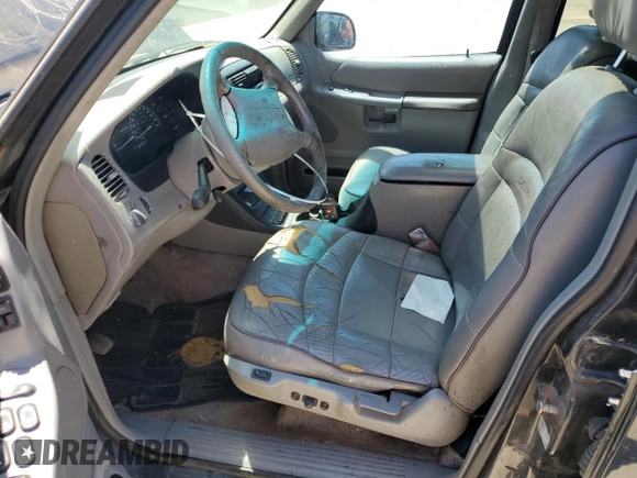 1997 Ford Explorer XLT with VIN 1FMDU35P5VZB51640, listed as a Copart auction lot 52030474 with 214,647 mi miles and Clean title. Bid and sale history available at DreamBid. Image 7.