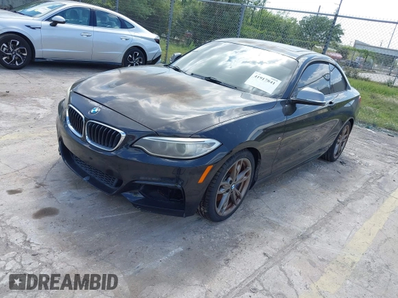 2014 BMW 2 Series M235i with VIN WBA1J7C50EVW84072, listed as a IAAI auction lot 41917841 with 102,745 mi miles and . Bid and sale history available at carsss.com. Image 2.