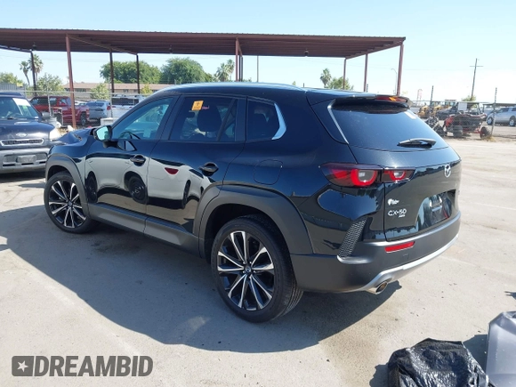 2023 Mazda CX-50 Meridian Edition z VIN 7MMVABXY1PN149136, wystawiony jako IAAI lot #42587764 z przebiegiem 4 748 mil mil oraz . Historia ofert i sprzedaży dostępna na DreamBid. Obrazek 3.