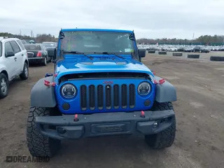 2016 Jeep Wrangler Unlimited Rubicon with VIN 1C4BJWFG2GL192074, listed as a IAAI auction lot 41598861 with 70,000 mi miles. Bid and sale history available at carsss.com. Image 12.