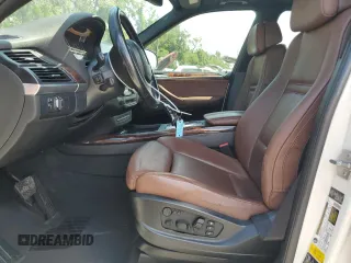 2012 BMW X5 35d with VIN 5UXZW0C57CL672443, listed as a Copart auction lot 55689215 with 247,014 mi miles and Clean title. Bid and sale history available at DreamBid. Image 7.