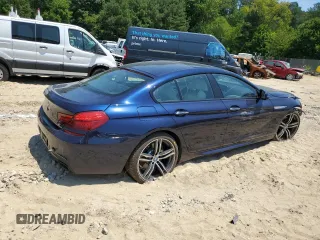2019 BMW 6 Series 650i with VIN WBA6D4C54KGA01093, listed as a Copart auction lot 61496984 with 23,951 mi miles and Salvage Title. Bid and sale history available at carsss.com. Image 3.