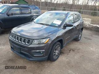 2019 Jeep Compass Latitude with VIN 3C4NJDBB1KT839413, listed as a IAAI auction lot 41437378 with 66,595 mi miles and . Bid and sale history available at DreamBid. Image 2.