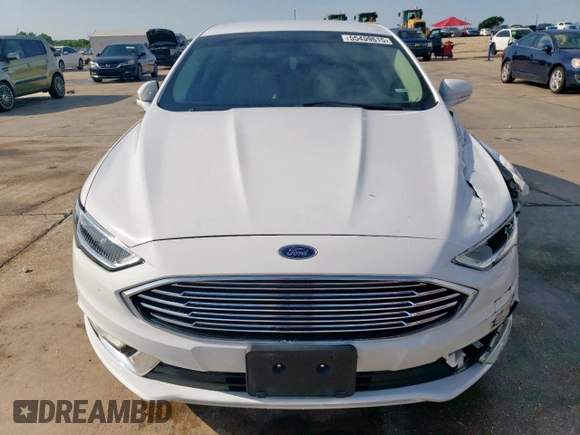 2017 Ford Fusion Titanium с VIN 3FA6P0K99HR118082, выставлен на аукционе Copart как лот 55459615 с пробегом 89 148 миль миль и Чистый • Clean title. История ставок и продаж доступна на DreamBid. Изображение 5.