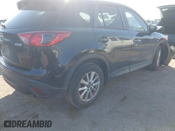 2016 Mazda CX-5 Touring with VIN JM3KE2CY6G0808992, listed as a IAAI auction lot 40969655 with 132,513 mi miles. Bid and sale history available at carsss.com. Image 4.