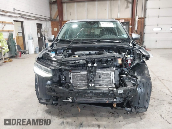 2024 Volkswagen Tiguan SE with VIN 3VVMB7AX8RM084483, listed as a IAAI auction lot 42452619 with 14,618 mi miles and . Bid and sale history available at DreamBid. Image 6.