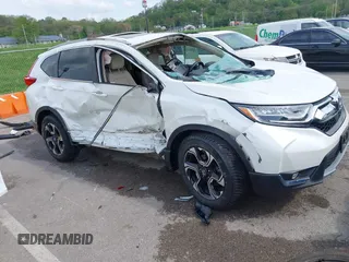 2018 Honda CR-V Touring with VIN 5J6RW2H99JL020598, listed as a IAAI auction lot 42104765 with 30,431 mi miles. Bid and sale history available at carsss.com. Image 1.