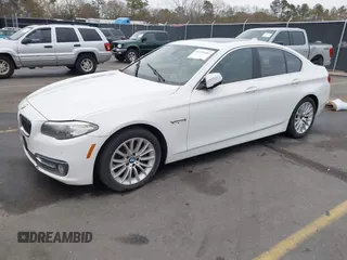 2015 BMW 5 Series 528i with VIN WBA5A5C5XFD516999, listed as a IAAI auction lot 41195184 with 131,187 mi miles. Bid and sale history available at carsss.com. Image 2.