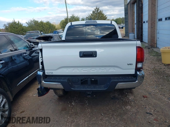 2023 Toyota Tacoma SR5 z VIN 3TYAZ5CN6PT039427, wystawiony jako IAAI lot #40866490 z przebiegiem 18 481 mil mil oraz . Historia ofert i sprzedaży dostępna na DreamBid. Obrazek 16.