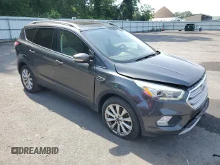 2018 Ford Escape Titanium with VIN 1FMCU9J91JUA47420, listed as a Copart auction lot 61846795 with 77,246 mi miles and Salvage title. Bid and sale history available at DreamBid. Image 4.