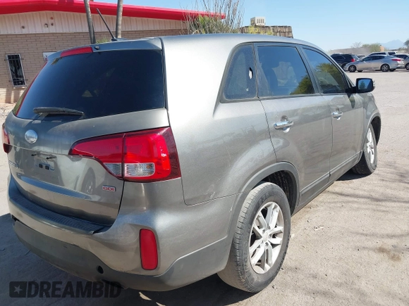 2014 Kia Sorento LX with VIN 5XYKT3A6XEG480411, listed as a IAAI auction lot 42008356 with 137,435 mi miles and . Bid and sale history available at DreamBid. Image 4.