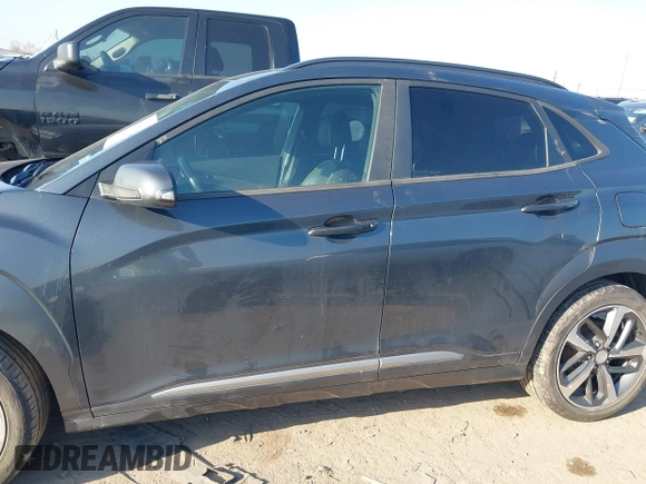 2018 Hyundai Kona Limited with VIN KM8K33A57JU072329, listed as a IAAI auction lot 41694616 with 107,801 mi miles. Bid and sale history available at carsss.com. Image 14.