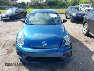 2018 Volkswagen Beetle S with VIN 3VWFD7AT9JM712664, listed as a IAAI auction lot 41634663 with 72,649 mi miles. Bid and sale history available at carsss.com. Image 12.