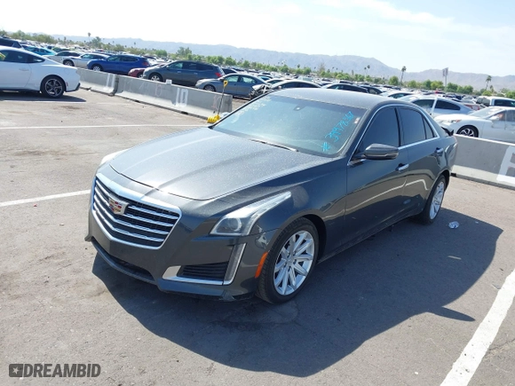 2016 Cadillac CTS Sedan RWD with VIN 1G6AP5SX8G0106667, listed as a IAAI auction lot 39978567 with 96,773 mi miles. Bid and sale history available at carsss.com. Image 2.