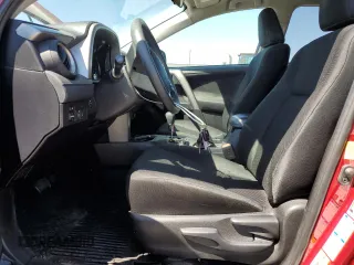 2018 Toyota RAV4 LE with VIN 2T3BFREV9JW852635, listed as a Copart auction lot 59807005 with 60,519 mi miles and Salvage title. Bid and sale history available at DreamBid. Image 7.