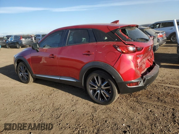 2018 Mazda CX-3 Grand Touring z VIN JM1DKFD79J0313779, wystawiony jako Copart lot #49120125 z przebiegiem 40 703 mil mil oraz Szkody całkowita. Historia ofert i sprzedaży dostępna na DreamBid. Obrazek 2.