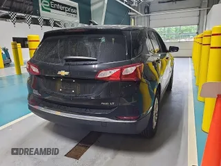 2021 Chevrolet Equinox LT with VIN 2GNAXTEV8M6112698, listed as a IAAI auction lot 42547280 with 66,209 mi miles and . Bid and sale history available at DreamBid. Image 51.