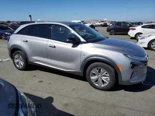 2021 Hyundai NEXO z VIN KM8J74A63MU017007, wystawiony jako Copart lot #73731404 z przebiegiem 11 585 mil mil oraz Czysty tytuł • Clean title. Historia ofert i sprzedaży dostępna na DreamBid. Obrazek 4.