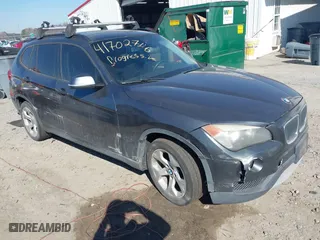 2014 BMW X1 sDrive28i with VIN WBAVM1C57EVW52502, listed as a IAAI auction lot 41702746 with 165,089 mi miles. Bid and sale history available at carsss.com. Image 1.